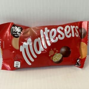 Maltesers Bag (37g) in vibrant red, English-made, with classic white script; iconic treat of crisp malted milk chocolate balls.