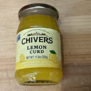 Chivers Lemon Curd jar—classic British preserve, golden lemon hue, vintage yellow label on glass, perfect for traditional teatime toast.