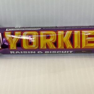 A Nestlé Yorkie Biscuit Raisin bar in a rich purple wrapper, echoing Welsh tradition, evokes hearty Celtic snacking heritage.