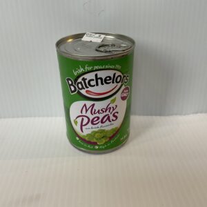 A classic British Batchelors Mushy Peas tin with rich green Celtic-inspired label, echoing UK comfort food tradition.