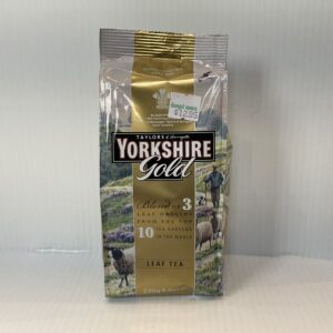 Yorkshire Gold Loose Tea 250g tin, English countryside with woolly sheep, classic pastoral art, heritage blend, perfect for teatime.