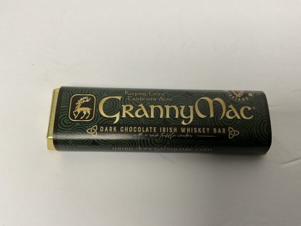 Irish-inspired GrannyMac Choc Whiskey Bar, 50g; rich green-gold Celtic knot motif evokes heritage and artisan chocolate craft.