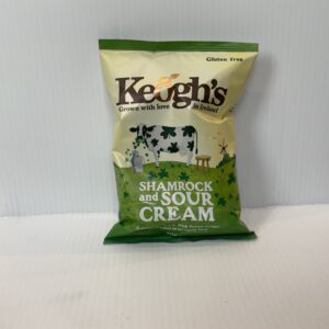 Irish Keogh’s Shamrock & Sour Cream crisps, in a green cream bag with Celtic knotwork, honoring traditional Irish flavors.