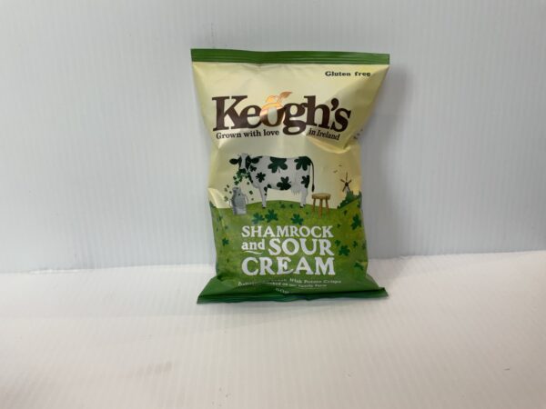 Irish Keogh’s Shamrock & Sour Cream crisps, in a green cream bag with Celtic knotwork, honoring traditional Irish flavors.